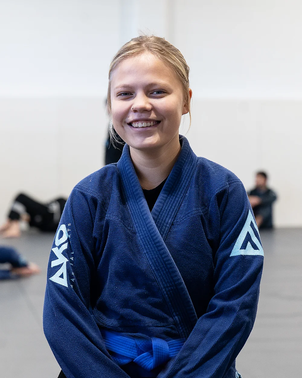 Coach Bea, a blue belt coach at Ako Martial Arts